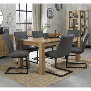 Bentley Designs Turin Light Oak 6-8 Seater Dining Table With 6 Lewis Distressed Dark Grey Fabric Cantilever Chairs