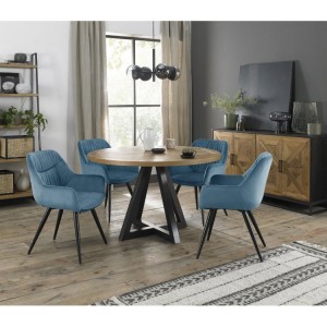 Bentley Designs Indus Rustic Oak 4 Seater Round Dining Table With 4 Petrol Blue Velvet Fabric Chairs