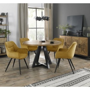 Bentley Designs Indus Rustic Oak 4 Seater Round Dining Table With 4 Mustard Velvet Fabric Chairs