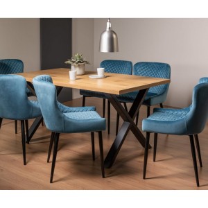Bentley Designs Ramsay Rustic Oak Effect Melamine 6 Seater X Leg Dining Table With 6 Cezanne Petrol blue Velvet Fabric Chairs